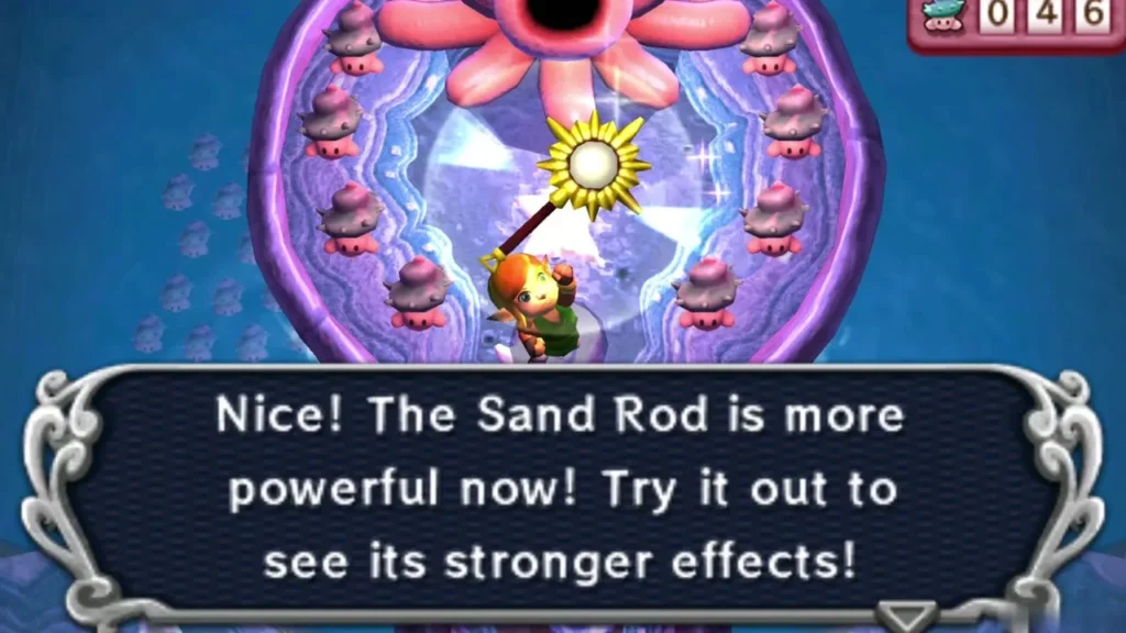 Link holding the upgraded Sand Rod, with a message saying it is more powerful Link holding the upgraded Sand Rod, with a message saying it is more powerful