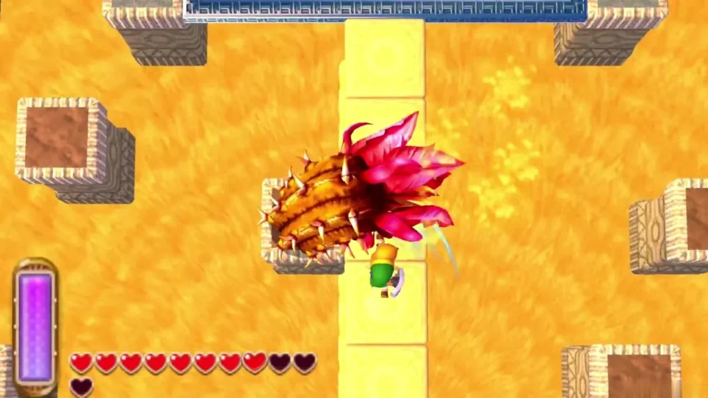 Link on a sand pillar facing Zaganaga's spiked tail in the arena Link on a sand pillar facing Zaganaga's spiked tail in the arena