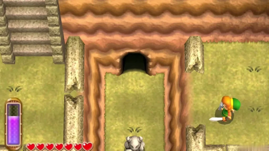 Dark cave entrance in the grass beside the stone steps in the Eastern Ruins Dark cave entrance in the grass beside the stone steps in the Eastern Ruins