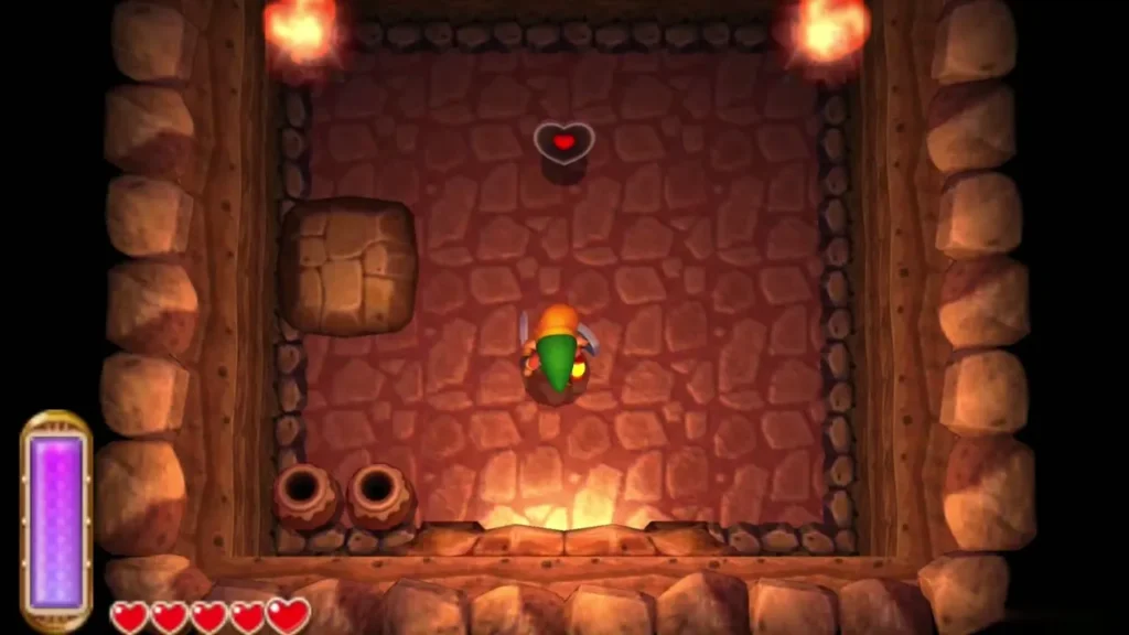 Inside the waterfall cave, the Heart Piece sits on the wall above Link Inside the waterfall cave, the Heart Piece sits on the wall above Link