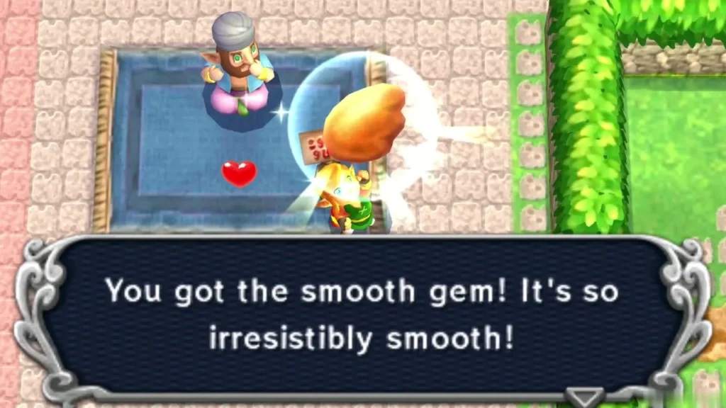 Link holds up the Smooth Gem he bought, with the 'You got the smooth gem' message box Link holds up the Smooth Gem he bought, with the 'You got the smooth gem' message box