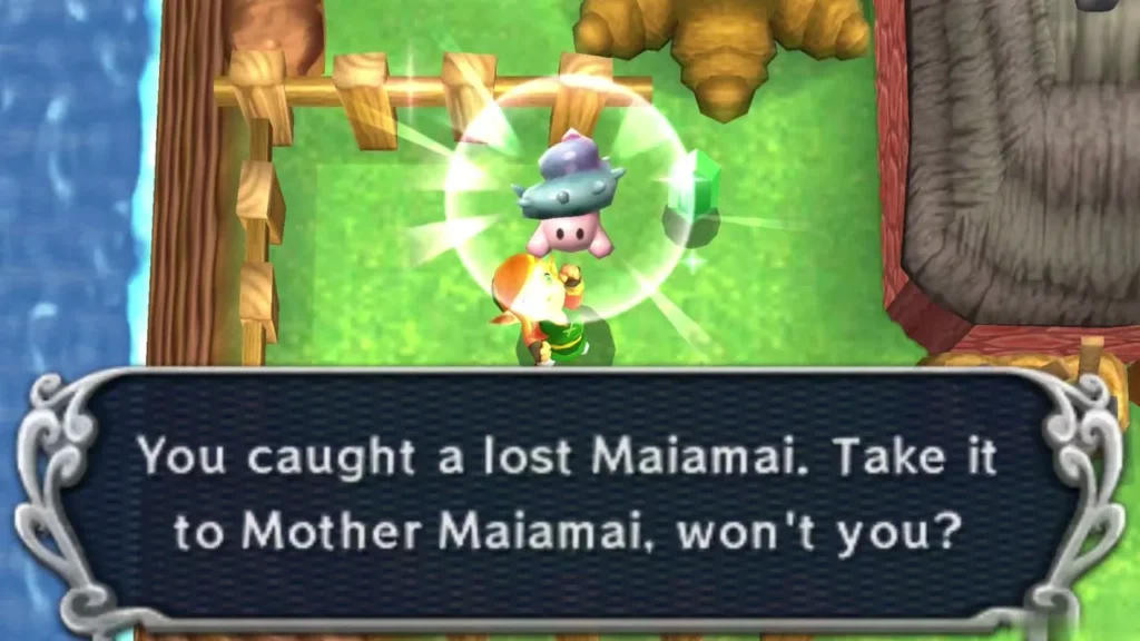 Link lifting a caught Maiamai on the grass beside the lake and a fence Link lifting a caught Maiamai on the grass beside the lake and a fence
