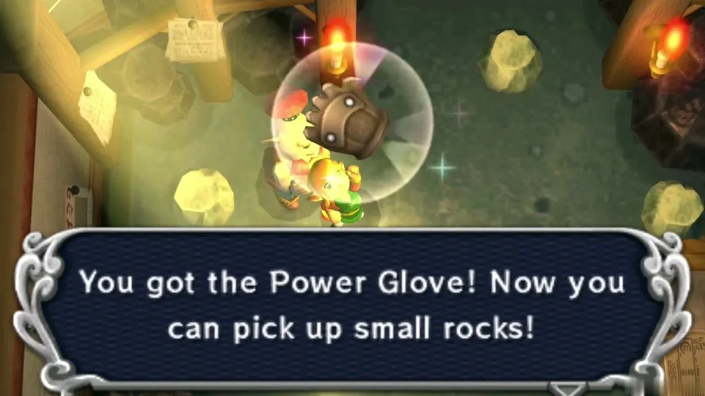 Link holds up the Power Glove over his head in the village, the box says he can now pick up small rocks Link holds up the Power Glove over his head in the village, the box says he can now pick up small rocks