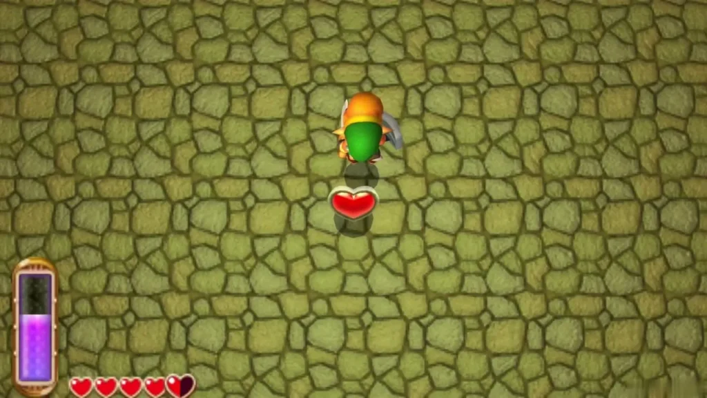 A Heart Container dropping on the floor as Link steps toward it A Heart Container dropping on the floor as Link steps toward it