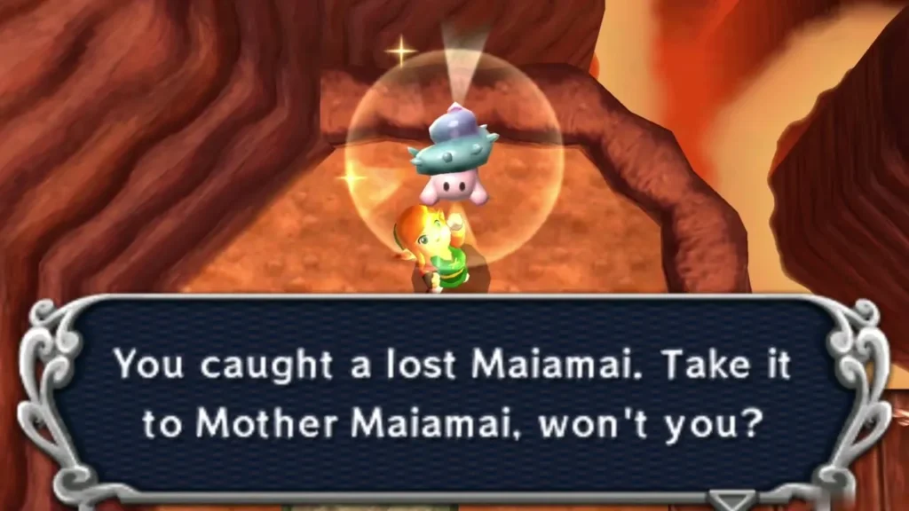 Link holding up a lost Maiamai in the cave, with the box telling him to take it to Mother Maiamai Link holding up a lost Maiamai in the cave, with the box telling him to take it to Mother Maiamai