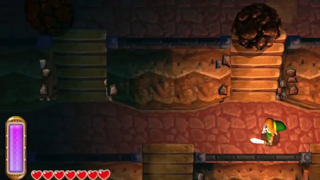 A boulder rolls down the top of the second cave stairs while Link waits on the landing below A boulder rolls down the top of the second cave stairs while Link waits on the landing below