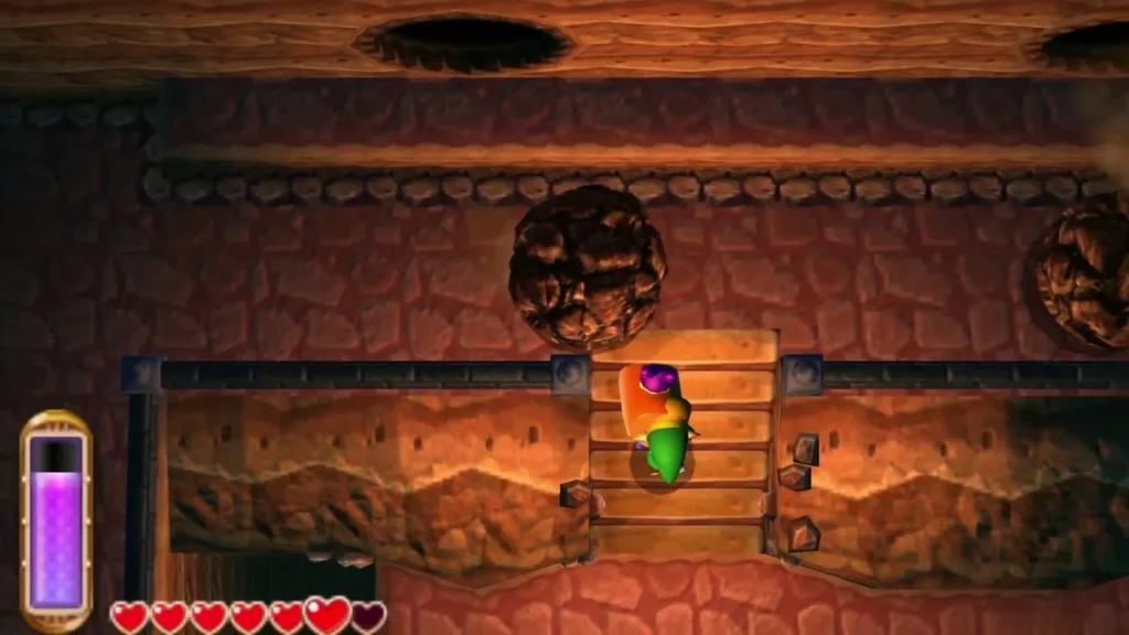 Link climbs the wooden stairs in the second cave with a boulder above him Link climbs the wooden stairs in the second cave with a boulder above him
