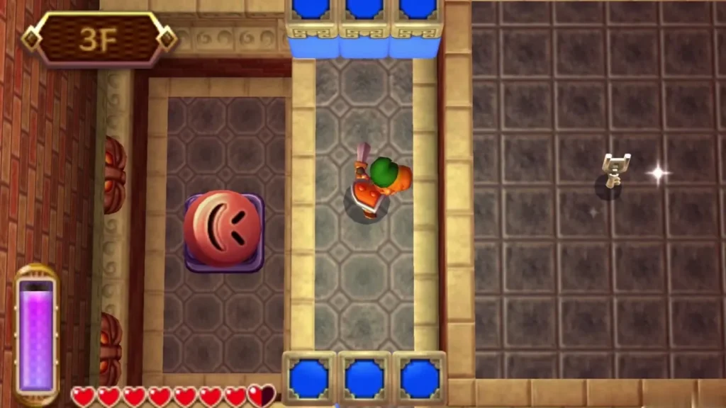 Link in the 3F corridor with a Small Key glinting on a platform out of reach Link in the 3F corridor with a Small Key glinting on a platform out of reach