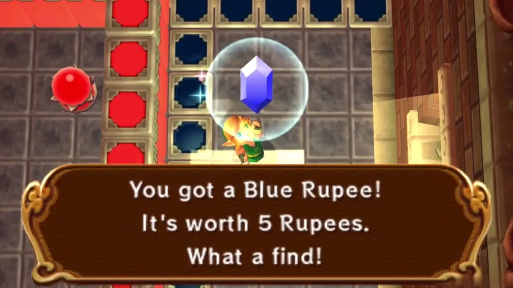 Link holds up a Blue Rupee in the crystal switch room, with the full 'You got a Blue Rupee' box Link holds up a Blue Rupee in the crystal switch room, with the full 'You got a Blue Rupee' box