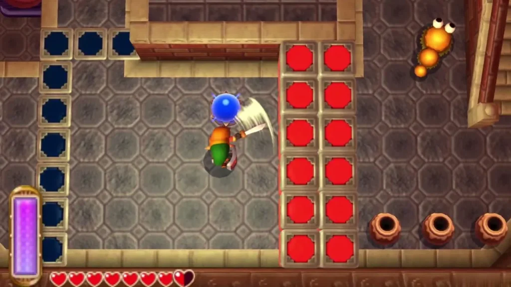 Link's sword striking the blue crystal switch as the red tiles rise beside him Link's sword striking the blue crystal switch as the red tiles rise beside him