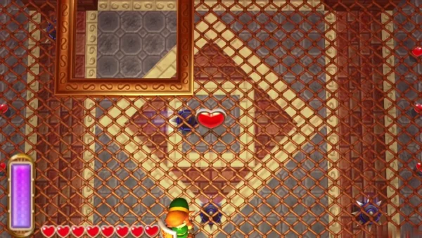 A Heart Container floating up over the arena floor after Moldorm falls A Heart Container floating up over the arena floor after Moldorm falls