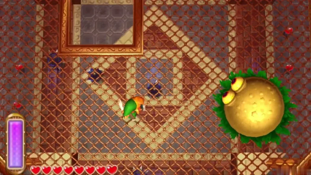 Link on the grating arena beside Moldorm, with open drops at the edges Link on the grating arena beside Moldorm, with open drops at the edges