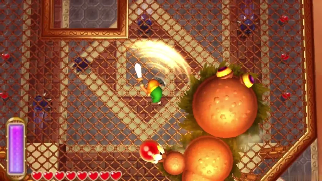 Link slashing at Moldorm's segmented body in the tower's top chamber Link slashing at Moldorm's segmented body in the tower's top chamber