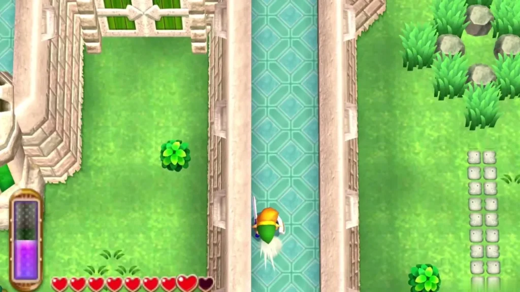 Link slashing along a water channel on the castle grounds, grass and stones beyond