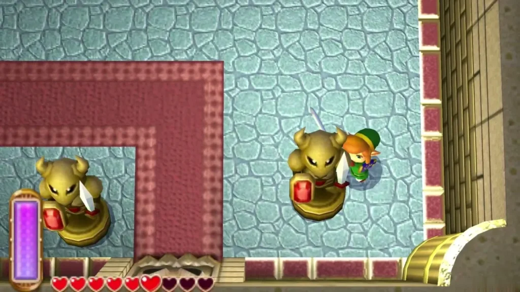 Gold statue enemies with red shields awake on the third floor, Link attacking one