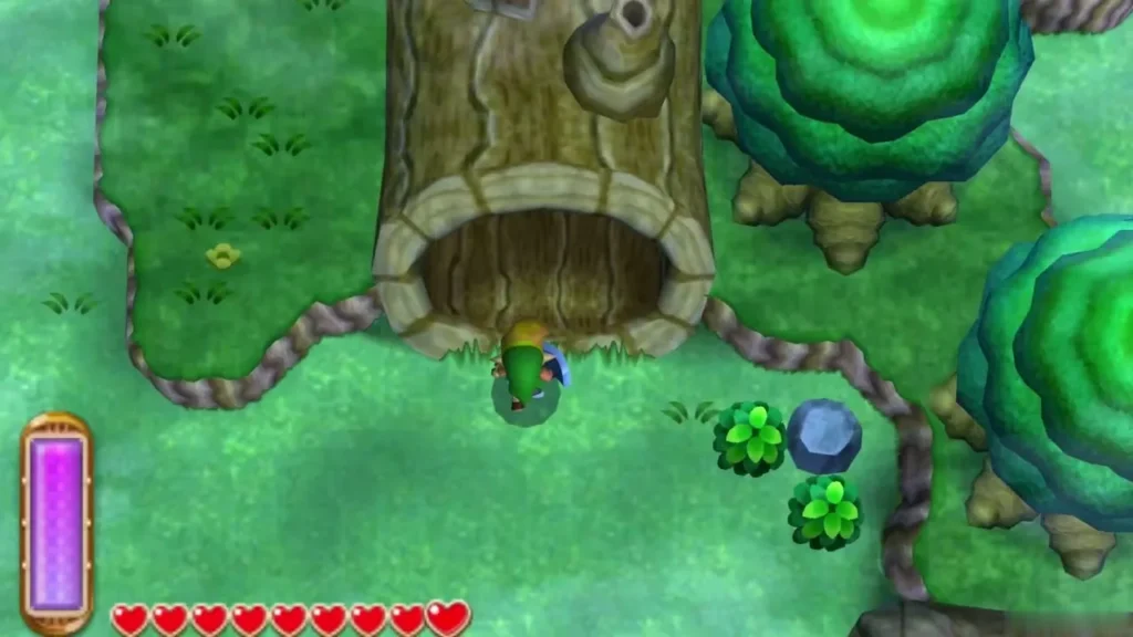Link at the base of a hollow tree trunk in the Lost Woods