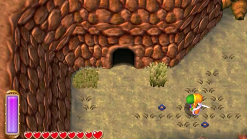 Cave entrance revealed in the rock wall after the boulder blast
