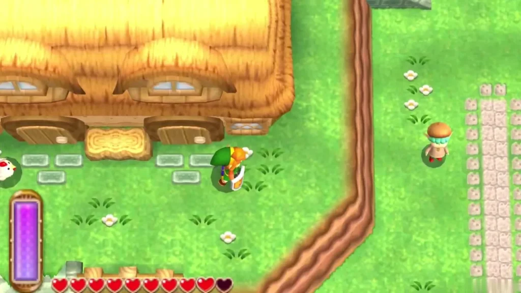 Link on grass beside a thatched house and a stone path, just before the fissure