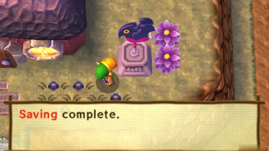 The bird-topped Weather Vane pedestal with a Saving complete message box at the bottom of the screen