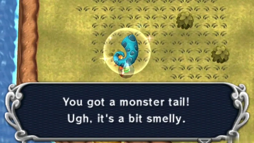 Link holding up a Monster Tail by the water, the box reading You got a monster tail