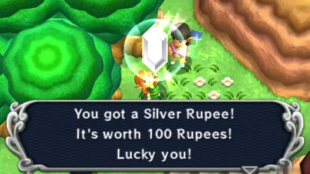 Link holds up a Silver Rupee in the pop-up box worth 100 Rupees