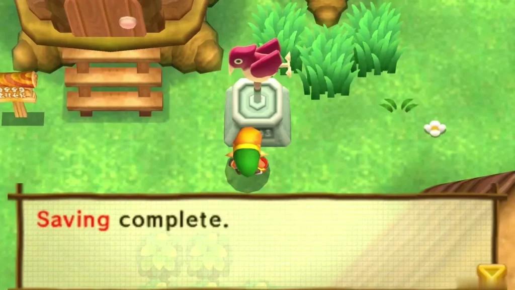 Link standing at a weather vane after saving, the message reading Saving complete
