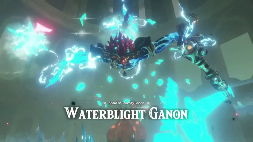 Waterblight Ganon's name card appears over a cyan-lit chamber, labelled Shard of Calamity Ganon, as the boss flies in