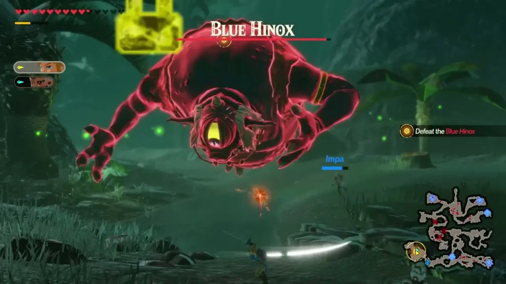 A Blue Hinox, named over its health bar, hovers over a swamp with its weak point glowing