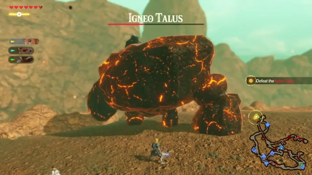 A lava-cracked Igneo Talus, a rock boss, stands under its Defeat the Igneo Talus objective