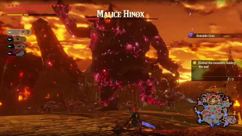 A Malice Hinox, named at top, looms over a burning field during the battle to hold the wall