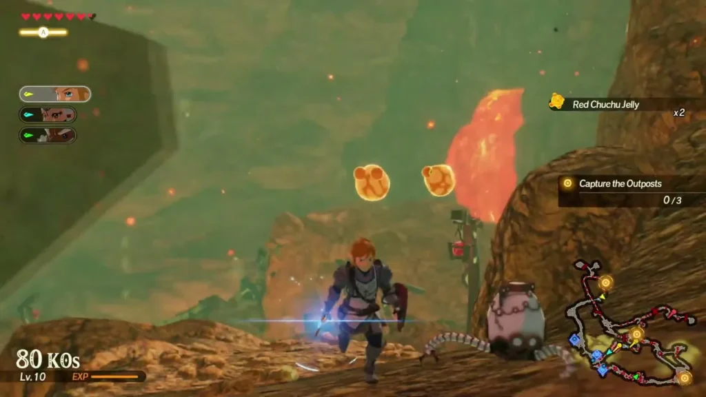 Red Chuchu Jelly drops hang in the air beside Link during an outpost battle