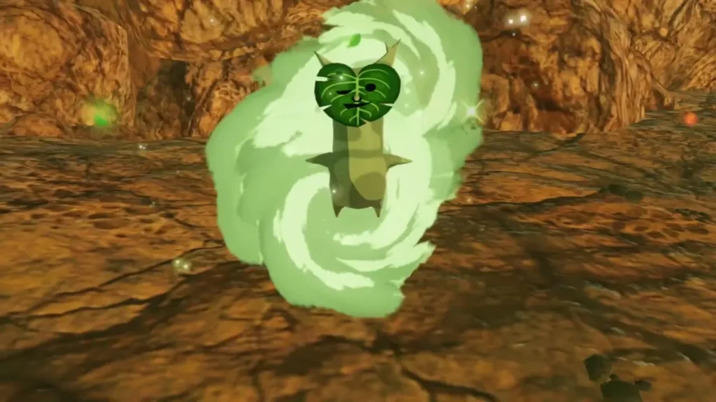 A green Korok rises from a glow on the rocky canyon floor A green Korok rises from a glow on the rocky canyon floor