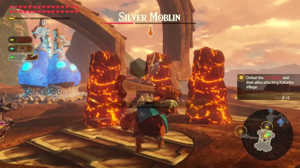 Silver Moblin stands between glowing lava pillars while the Defeat the Fire Moblin objective shows Silver Moblin stands between glowing lava pillars while the Defeat the Fire Moblin objective shows