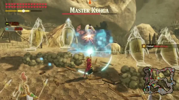 Riju fights Master Kohga, his name over the health bar and the Defeat Master Kohga objective on screen Riju fights Master Kohga, his name over the health bar and the Defeat Master Kohga objective on screen
