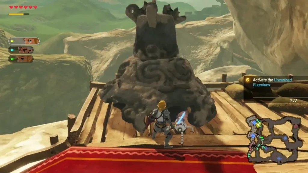 Link stands beside an Unearthed Guardian on a red-carpeted platform, its objective counter at 2 of 2 Link stands beside an Unearthed Guardian on a red-carpeted platform, its objective counter at 2 of 2