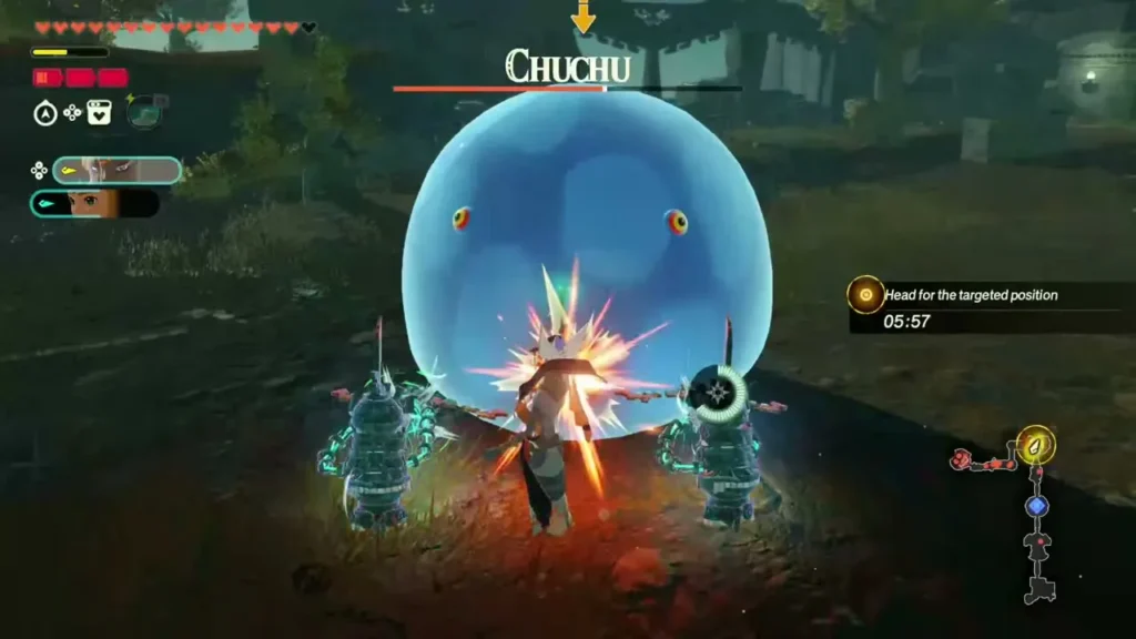 Mineru fights a giant Chuchu beside two small constructs Mineru fights a giant Chuchu beside two small constructs