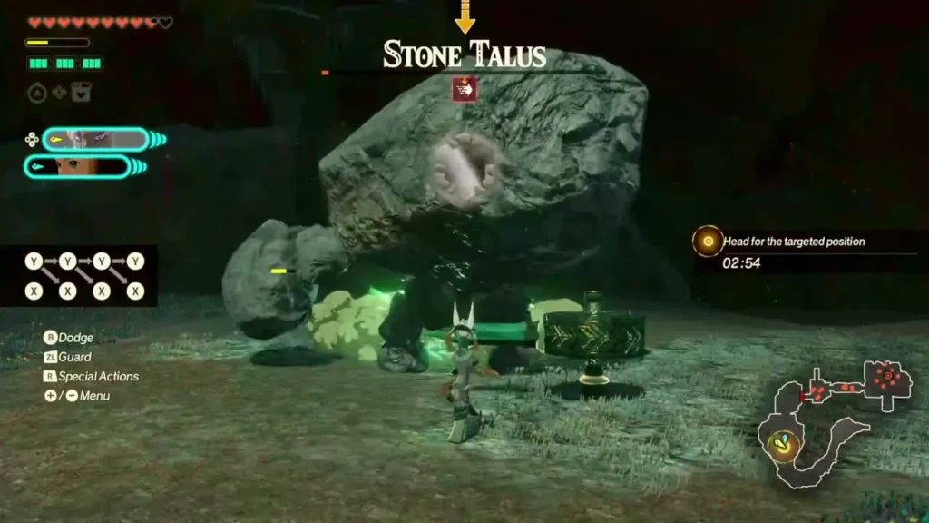 Mineru uses a Zonai hammer device against the Stone Talus and its exposed weak point Mineru uses a Zonai hammer device against the Stone Talus and its exposed weak point
