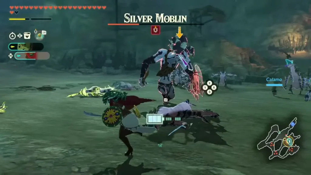 Ardi swings at the Silver Moblin with Calamo nearby
