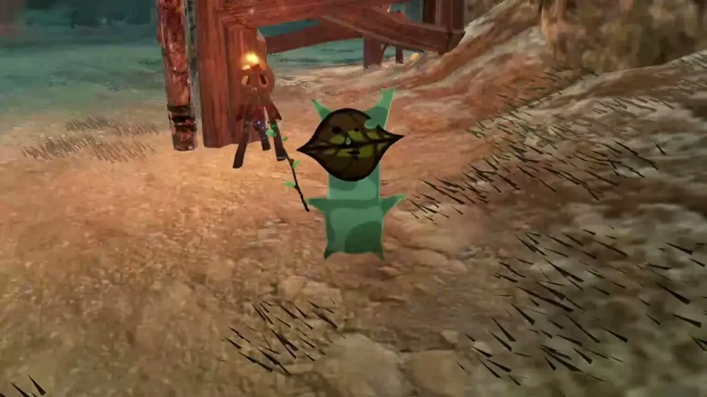 A Korok with a dark leaf mask stands at the outpost gate where the pinwheel spun