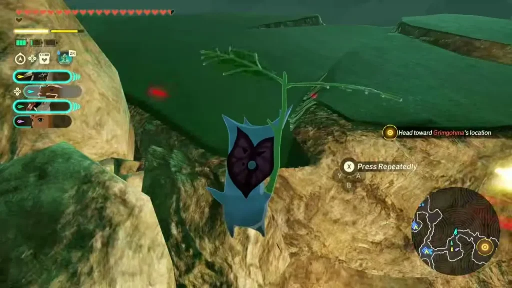 A Korok with a heart face stands over the rocks after the balloon is popped