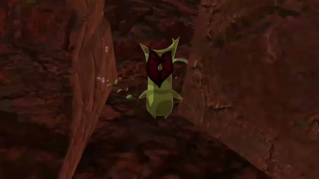A Korok waits in the gap behind the smashed boulder formation