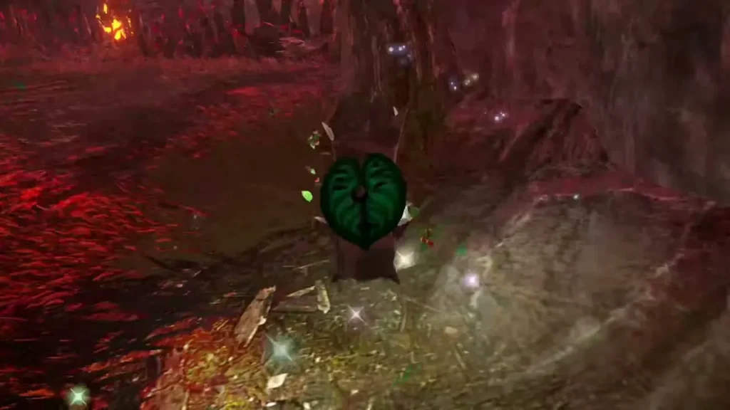 A Korok with a leaf face pops out at the foot of a large tree on the burning field