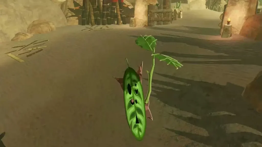 The Korok drops to the sand road in its leaf mask after the balloon pops