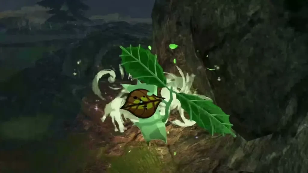 A Korok with a leaf appears beside a rock cliff after the balloon is popped