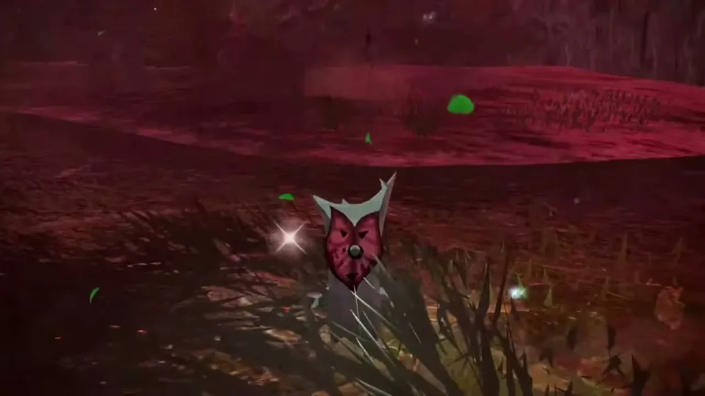 A Korok with a red leaf mask pops out of the glowing spot in the grass