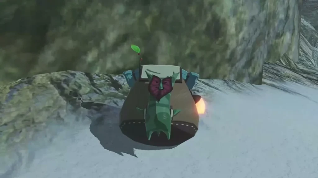 A Korok with a backpack sits in a tree stump on a snowy bank