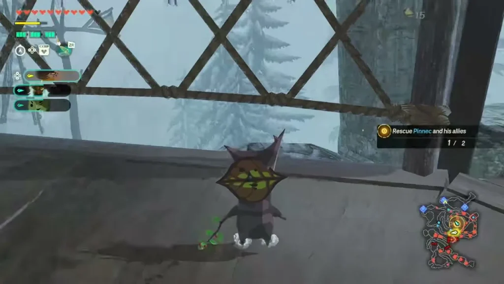 A Korok sits on a wooden platform at the end of a bridge in the snow