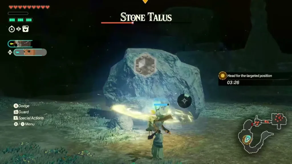 A Stone Talus shows its weak point while a warrior slashes at it A Stone Talus shows its weak point while a warrior slashes at it