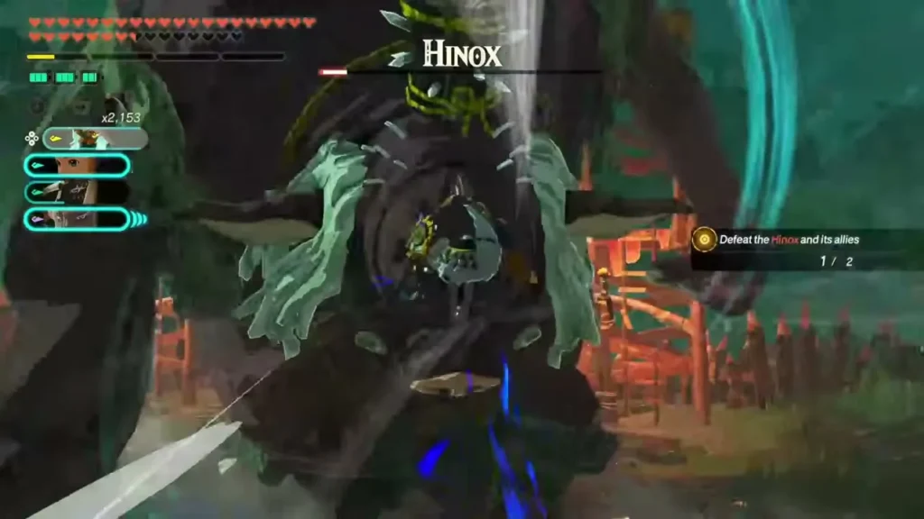 A Hinox rears up over the party at an Ash Swamp outpost