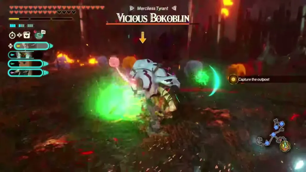 A Vicious Bokoblin stumbles amid green sparks and flames in the Seres Scablands